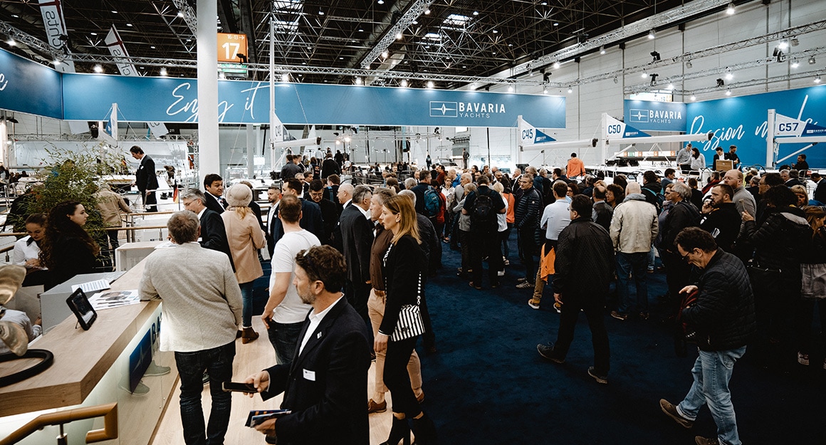 Dense crowds in the exhibition hall.