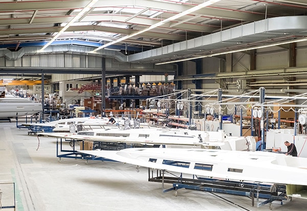 View of the BAVARIA shipyard with numerous yachts.