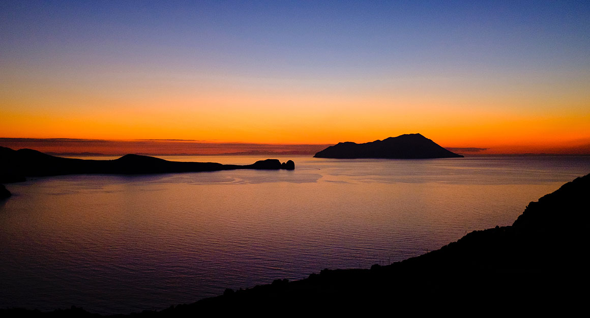 Beautiful sunset panorama of the Cyclades islands.