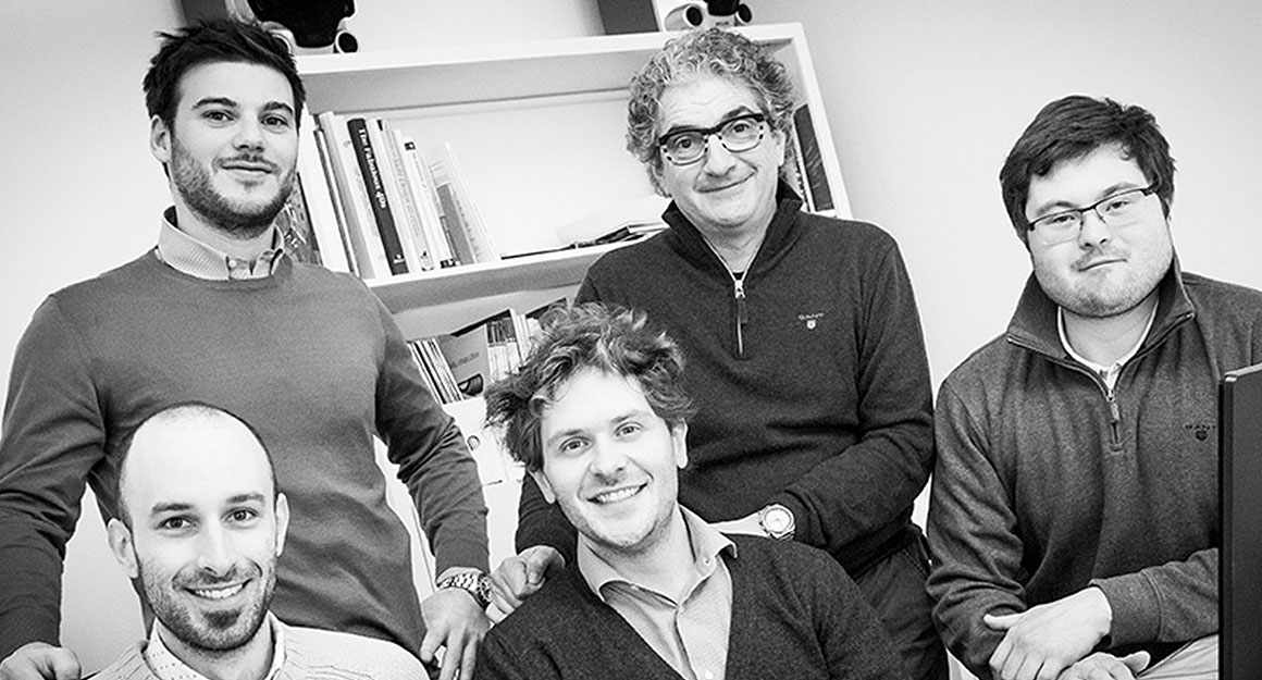 Yacht designer Maurizio Cossutti and his four male employees.