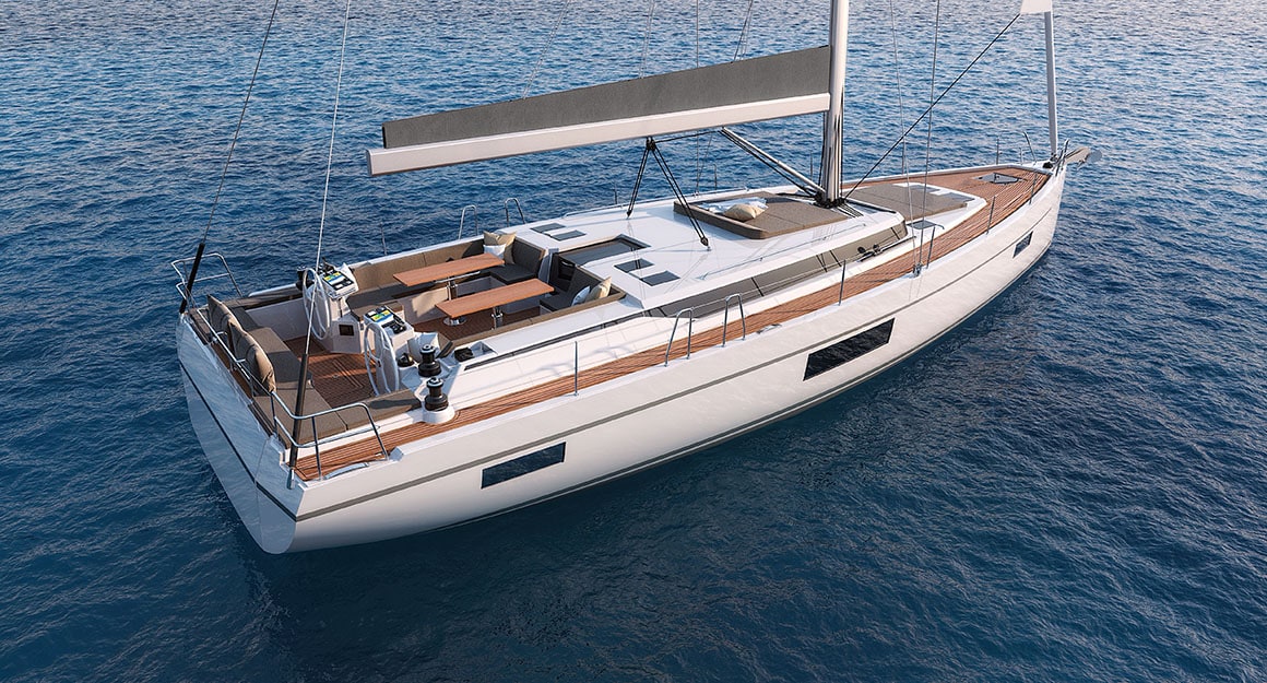 Side view of a sailing yacht on the calm deep blue water.