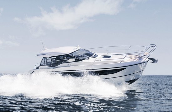 BAVARIA Motor yacht fastly cruising on the water