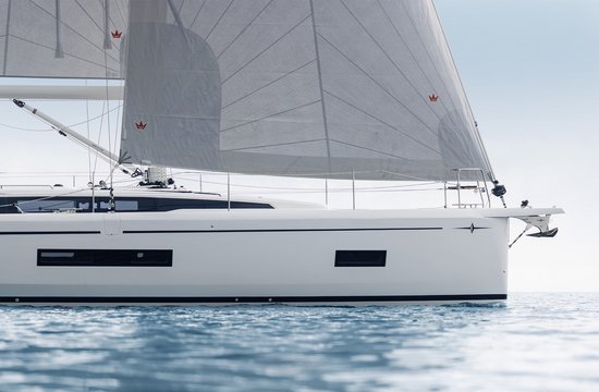 BAVARIA Sailing yacht on the water from the side