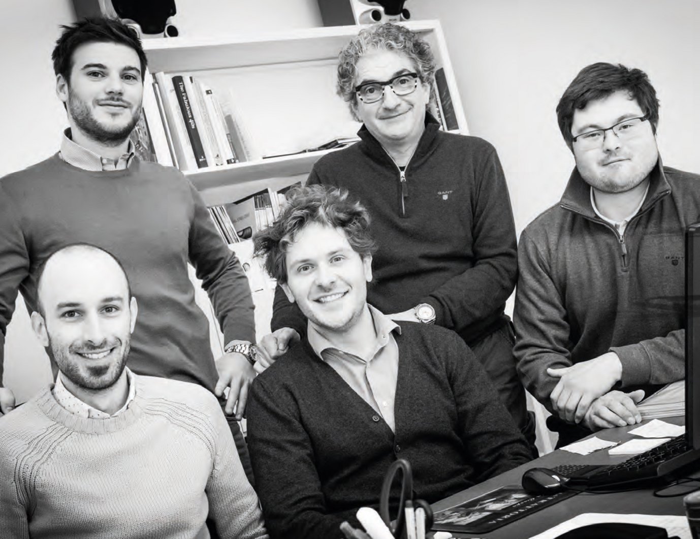 Black and white picture of Maurizio Cossutti, a yacht designer, with his four male colleagues.